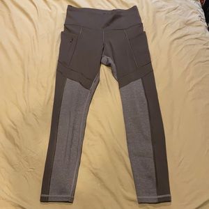 Calf-length Athleta leggings with pockets and drawstring waist
